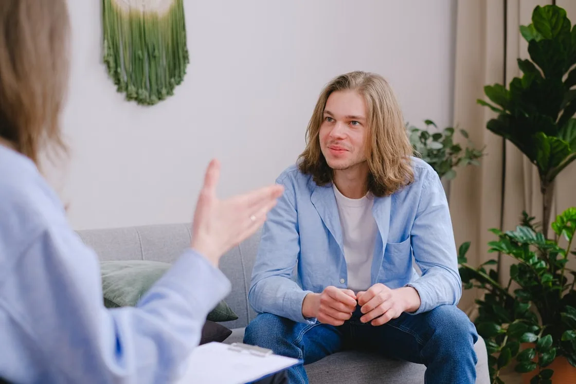 Patient speaking with a therapist during a counseling session