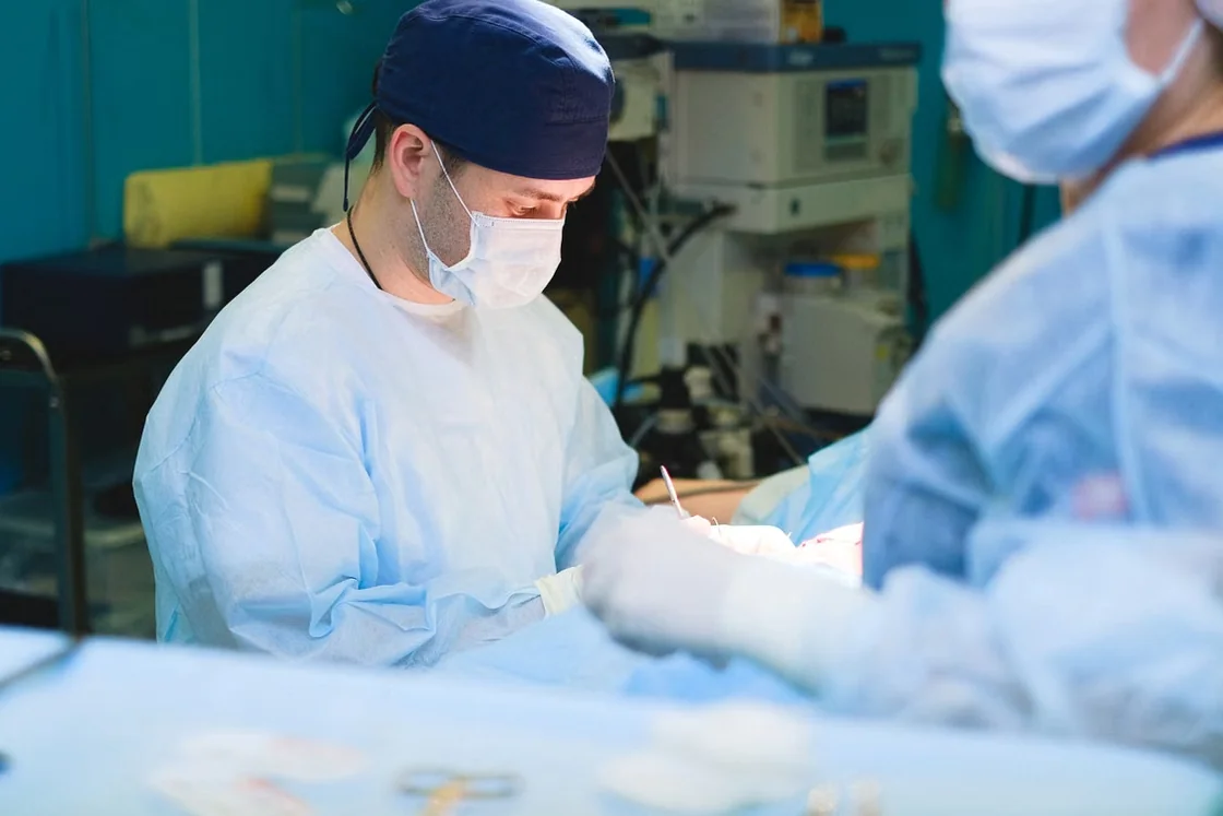 Surgeons working together in an operating room